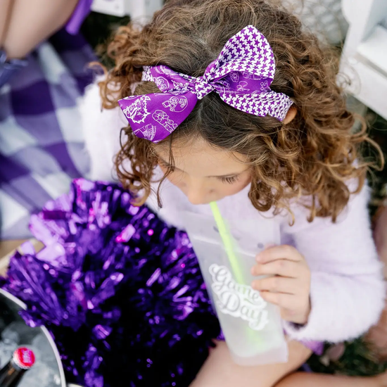 Purple TCU skinny scarf styled as an accessory