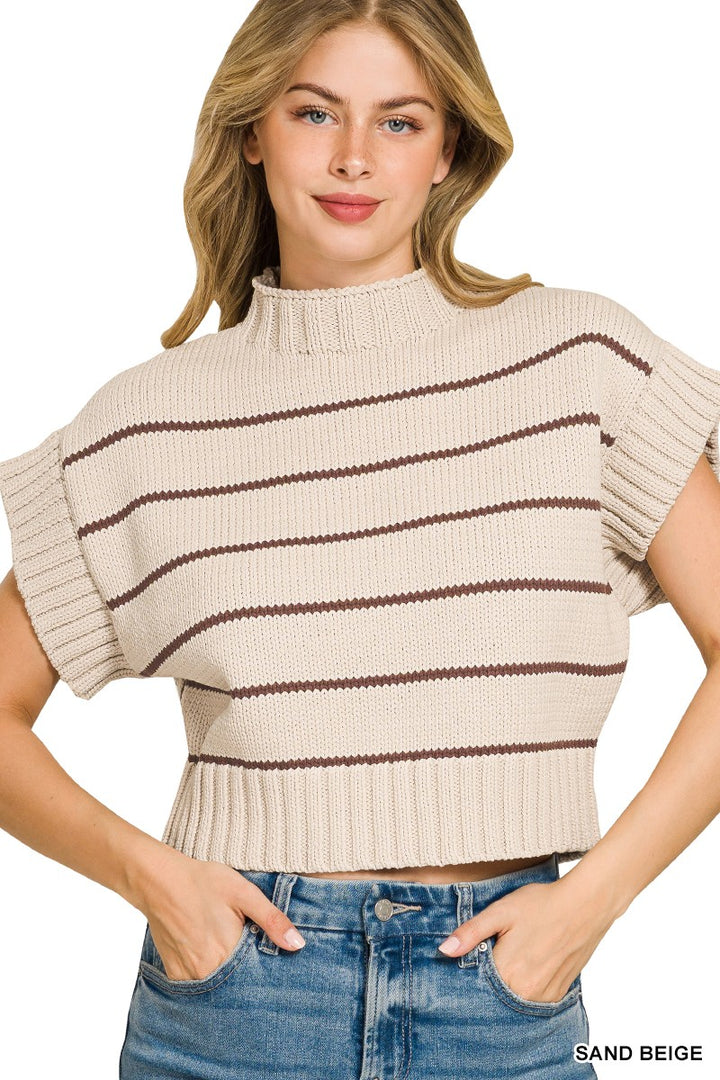 Model wearing sand-and-beige striped mock-neck sweater