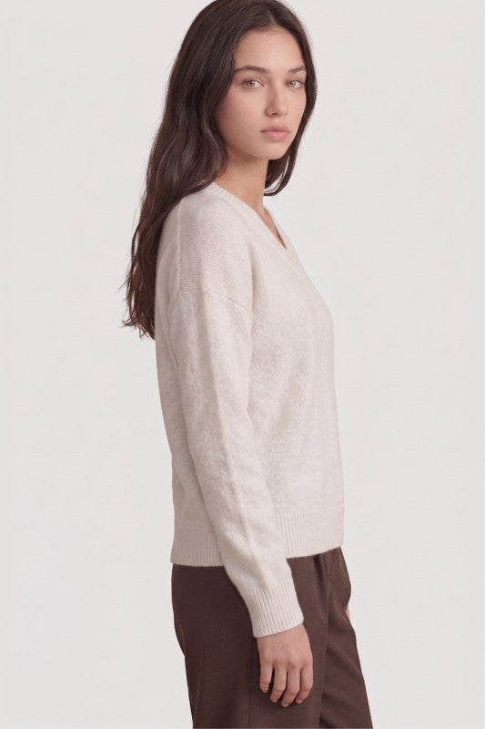 Ivory plush V-neck sweater side view