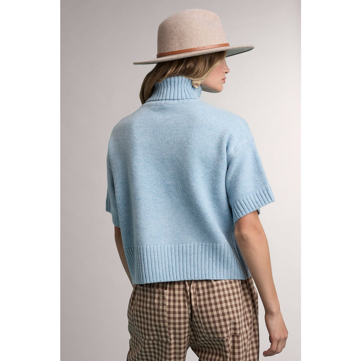 Light blue short-sleeve turtleneck sweater, back view
