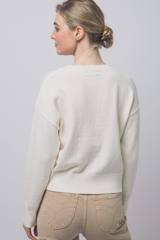 Ivory essential crewneck sweater back view