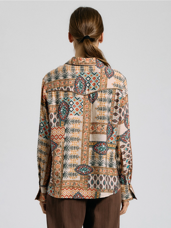 Back view of taupe patchwork-print button-up shirt