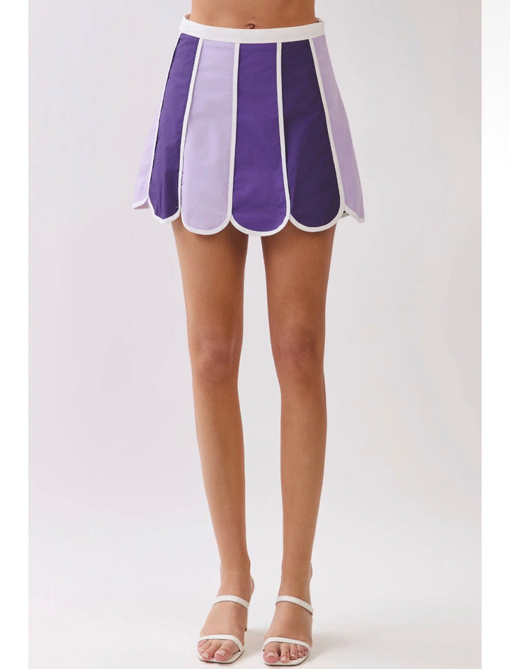 Model wearing purple colorblock-stripe A-line skirt