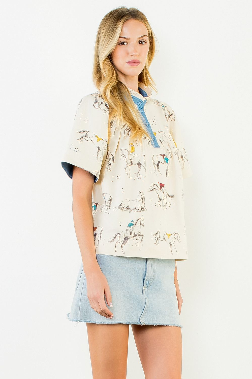 Cream embroidered horse top, side styling view