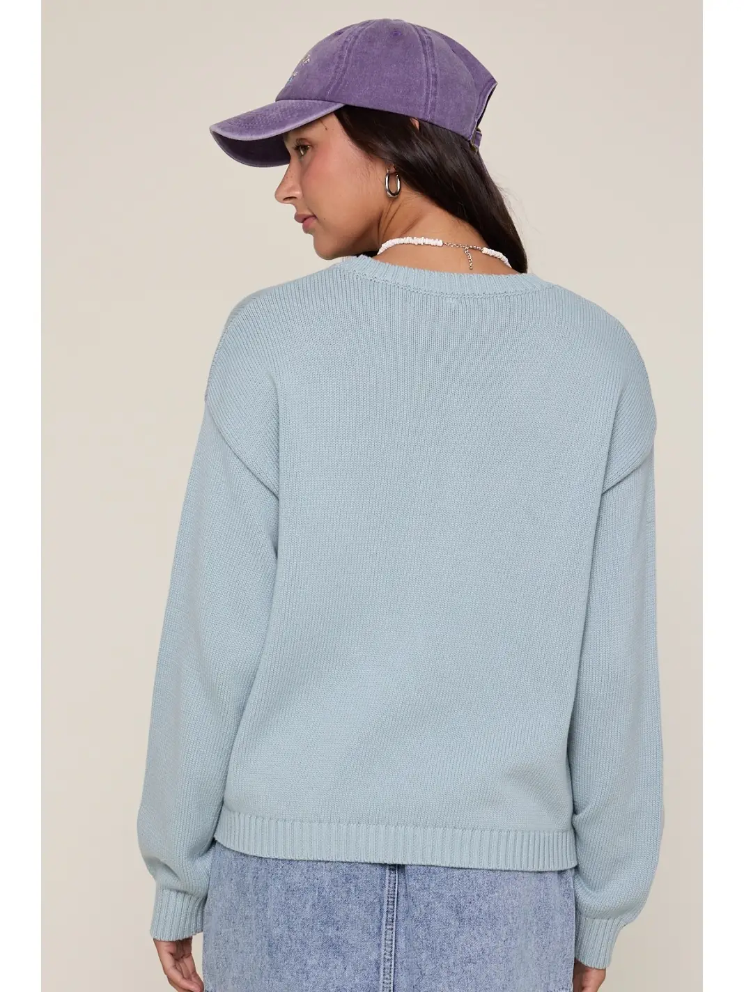 Light blue fish graphic crewneck sweater, back view