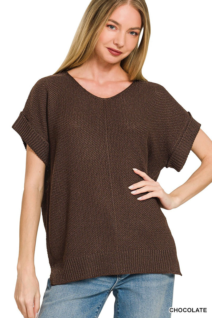 Model wearing chocolate center-seam short sleeve sweater