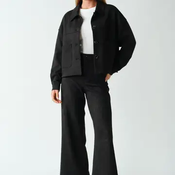 Black faux-suede wide-leg pants side view