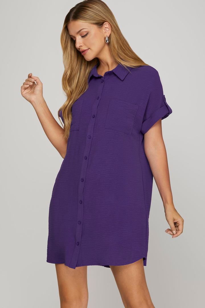 Model wearing purple drop-shoulder mini shirt dress