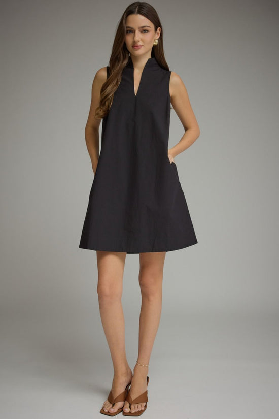 Black sleeveless split-neck mini dress with a stand collar and relaxed shift silhouette