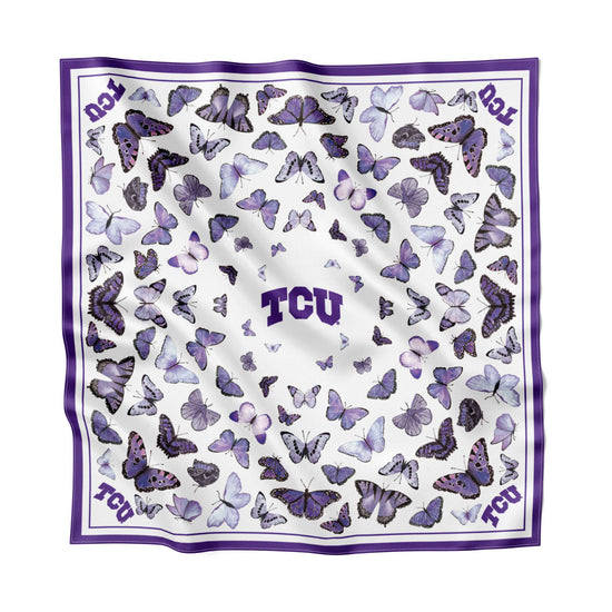 TCU butterfly silk scarf styled on a handbag