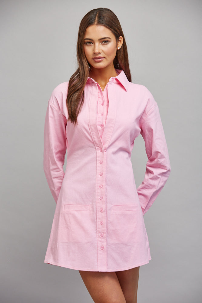 Model wearing pink structured A-line shirt dress
