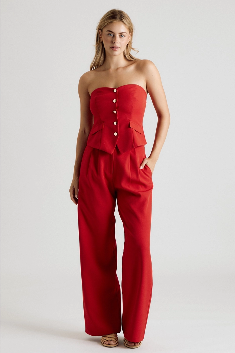 Full-length view of red strapless vest top matching set