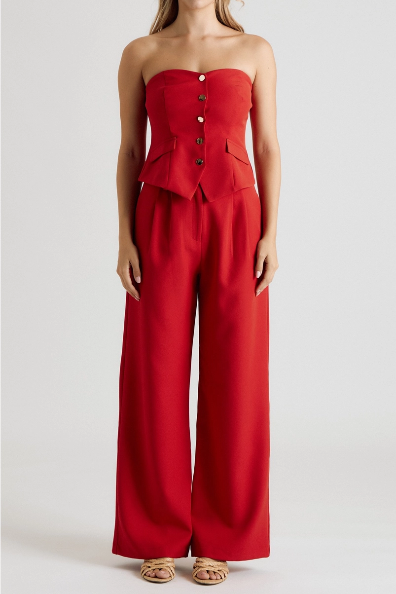 Red wide-leg trousers styled with matching strapless vest top