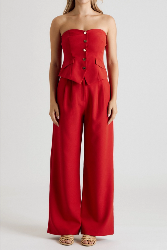 Red wide-leg trousers styled with matching strapless vest top