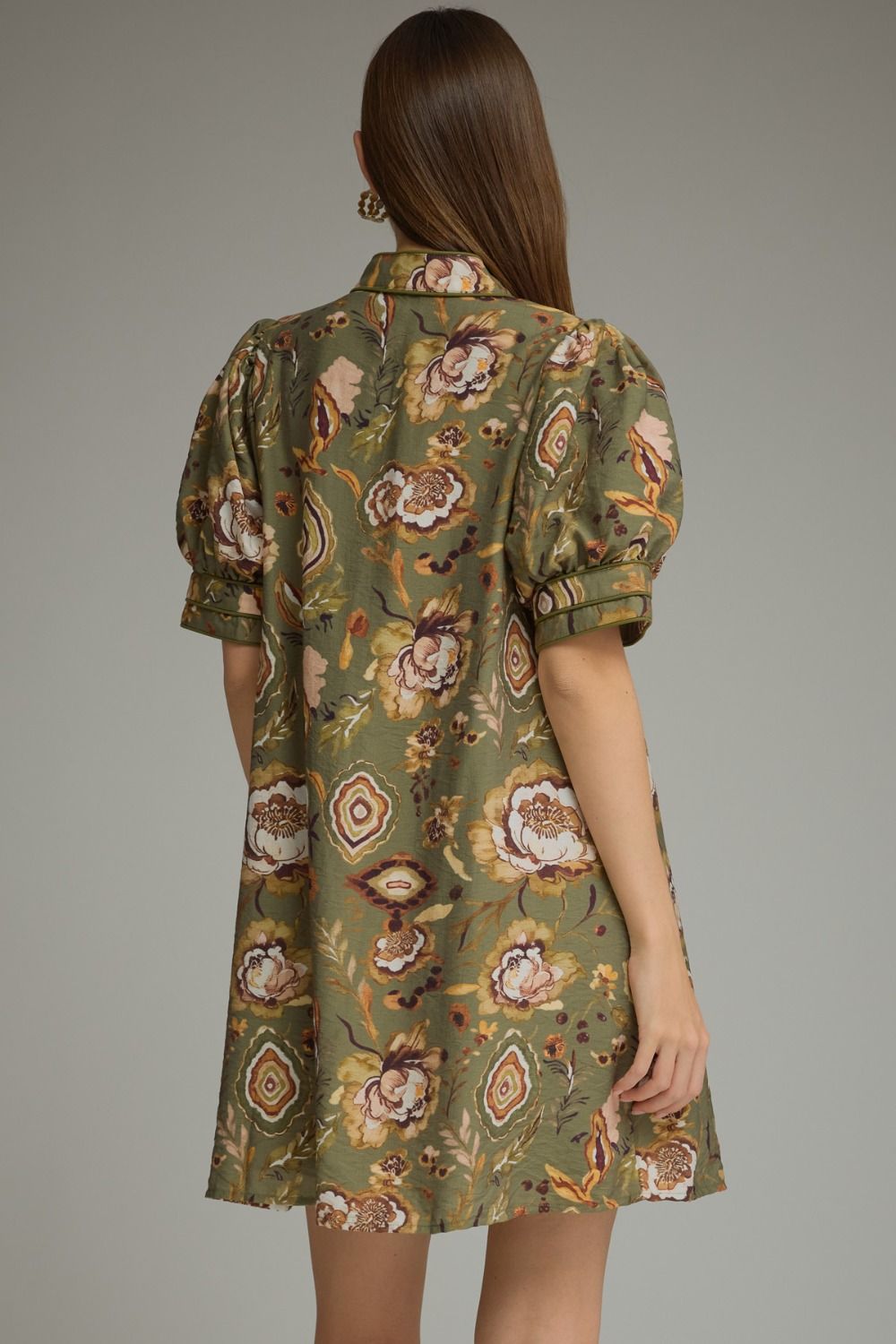 Green botanical mini dress by Entro, side view