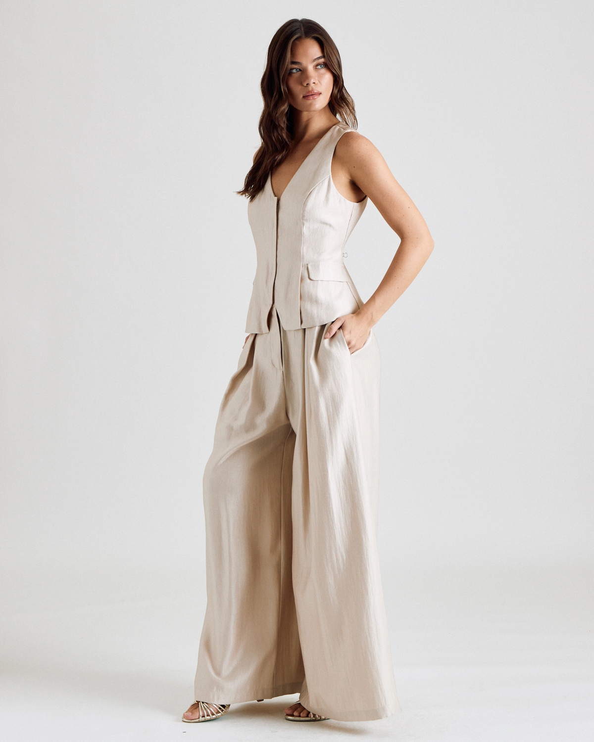 Tailored vest showing button front and shaped seams