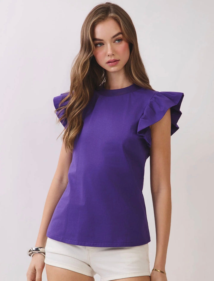 Model wearing purple ruffle-sleeve cotton poplin top