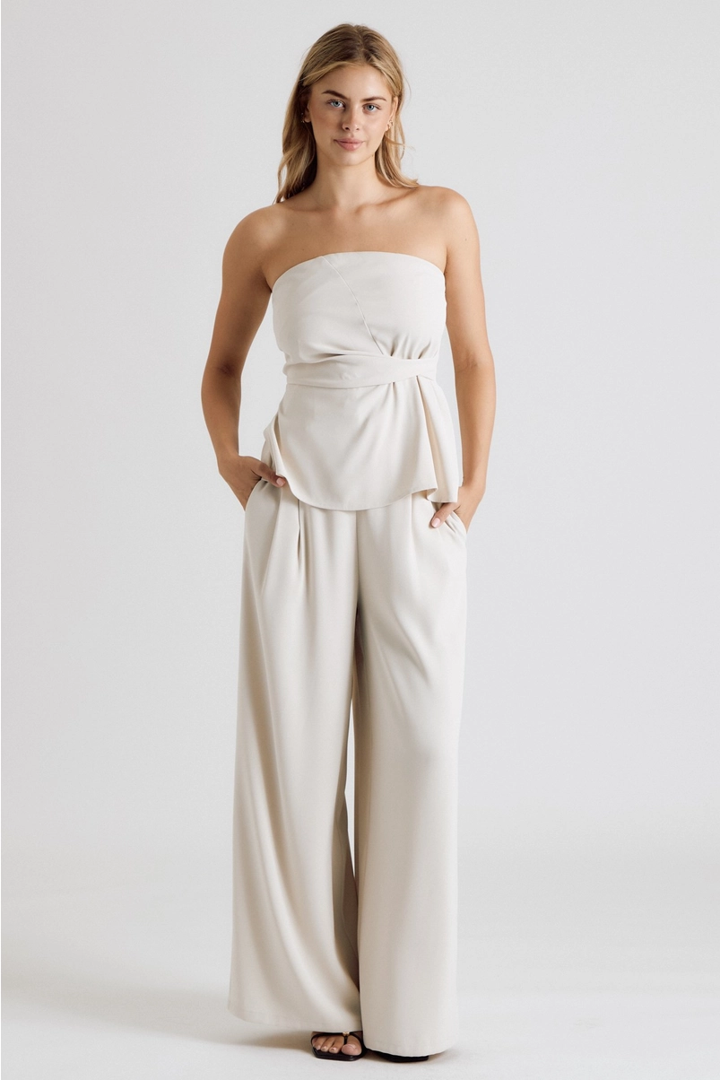 Full-length view of cream strapless top matching set